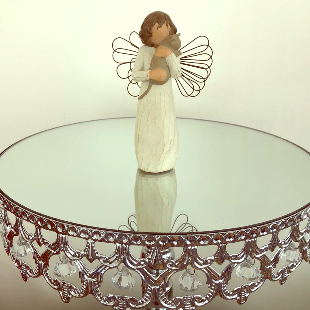 Willow Tree - With Affection. Girl holding cat.